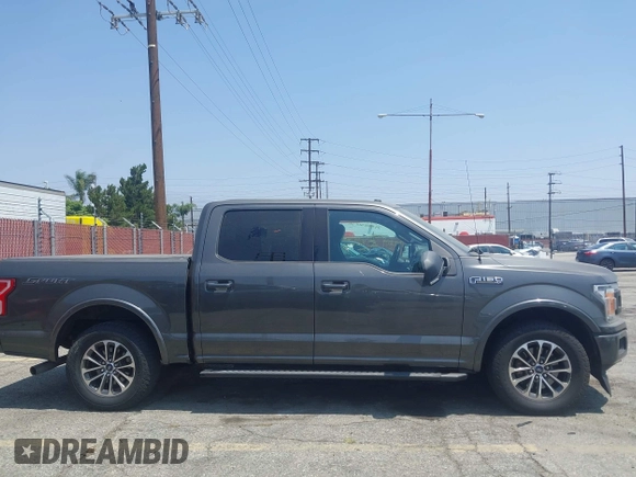 2018 Ford F-150 XL with VIN 1FTEW1CPXJKD56562, listed as a IAAI auction lot 42588371 with 137,496 mi miles and . Bid and sale history available at DreamBid. Image 13.