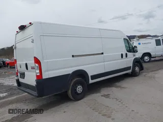 2022 Ram ProMaster Cargo with VIN 3C6MRVJG0NE114716, listed as a IAAI auction lot 40906614 with 164,182 mi miles and . Bid and sale history available at DreamBid. Image 4.