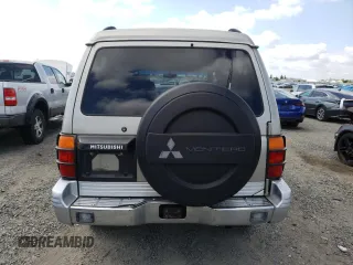 1998 Mitsubishi Montero z VIN JA4MR51RXWJ006418, wystawiony jako Copart lot #54878275 z przebiegiem 225 110 mil mil oraz Szkoda całkowita • Salvage title. Historia ofert i sprzedaży dostępna na DreamBid. Obrazek 6.