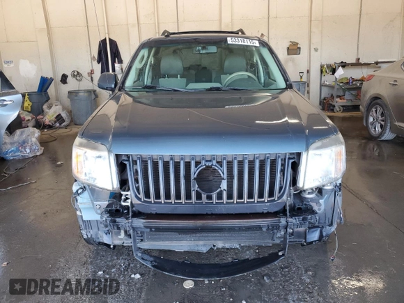 2010 Mercury Mariner Premier z VIN 4M2CN8HG3AKJ29557, wystawiony jako Copart lot #53318115 z przebiegiem 141 895 mil mil oraz Szkoda całkowita • Salvage title. Historia ofert i sprzedaży dostępna na DreamBid. Obrazek 5.