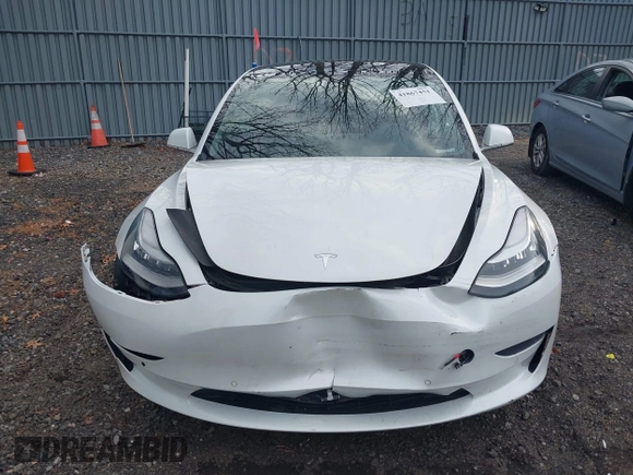 2020 Tesla Model 3 Long Range with VIN 5YJ3E1EB6LF618931, listed as a IAAI auction lot 41867451 with 47,502 mi miles and . Bid and sale history available at DreamBid. Image 12.
