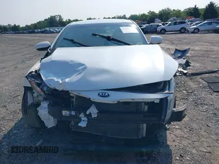 2015 Kia Optima LX z VIN KNAGM4A76F5569420, wystawiony jako IAAI lot #42423133 z przebiegiem 93 094 mil mil oraz . Historia ofert i sprzedaży dostępna na DreamBid. Obrazek 13.