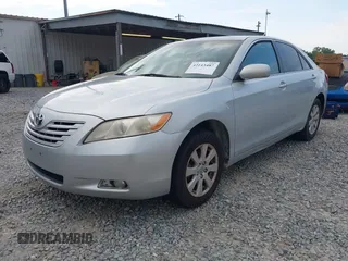 2007 Toyota Camry LE with VIN 4T1BK46KX7U530347, listed as a IAAI auction lot 42143487 with 254,337 mi miles and . Bid and sale history available at DreamBid. Image 2.