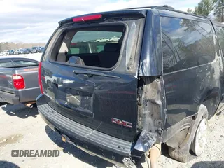 2013 GMC Yukon XL SLT with VIN 1GKS1KE02DR176998, listed as a IAAI auction lot 41839522 with 175,923 mi miles. Bid and sale history available at carsss.com. Image 6.