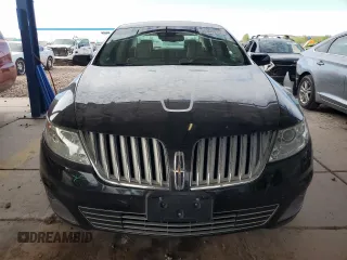 2012 Lincoln MKS с VIN 1LNHL9ER6CG807152, выставлен на аукционе Copart как лот 56309925 с пробегом 105 338 миль миль и Списание • Salvage title. История ставок и продаж доступна на DreamBid. Изображение 5.