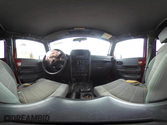 2007 Jeep Wrangler Unlimited Sahara with VIN 1J4GA59177L162022, listed as a IAAI auction lot 41887599 with 207,358 mi miles and . Bid and sale history available at DreamBid. Image 17.