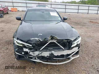 2019 BMW 3 Series 330i with VIN WBA5R1C51KAE82094, listed as a IAAI auction lot 39040815 with 66,344 mi miles and . Bid and sale history available at DreamBid. Image 13.