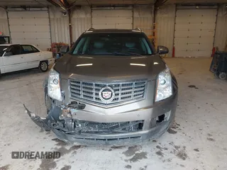 2015 Cadillac SRX Luxury Collection with VIN 3GYFNBE34FS575613, listed as a IAAI auction lot 41697251 with 173,117 mi miles and . Bid and sale history available at DreamBid. Image 12.