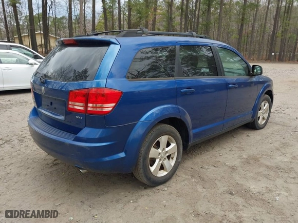 2009 Dodge Journey SXT with VIN 3D4GG57V49T192972, listed as a IAAI auction lot 41878886 with 170,500 mi miles. Bid and sale history available at carsss.com. Image 4.