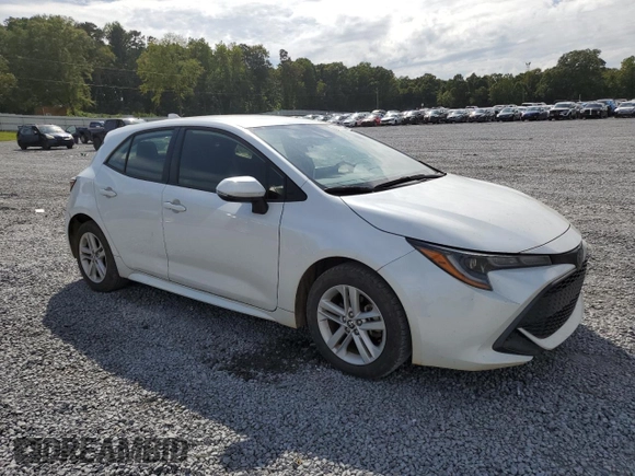 2021 Toyota Corolla Hatchback SE with VIN JTNB4MBE3M3131954, listed as a Copart auction lot 69966354 with 26,789 mi miles and Salvage Title. Bid and sale history available at carsss.com. Image 4.