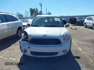 2014 MINI Countryman with VIN WMWZB3C52EWR42241, listed as a IAAI auction lot 41734963 with 121,325 mi miles and . Bid and sale history available at DreamBid. Image 12.