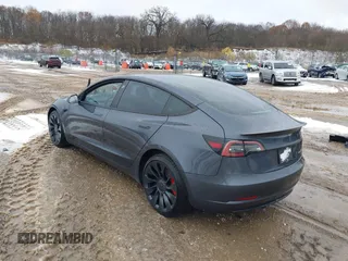 2023 Tesla Model 3 Performance with VIN 5YJ3E1EC6PF590739, listed as a IAAI auction lot 40919165 with 20,474 mi miles. Bid and sale history available at carsss.com. Image 3.