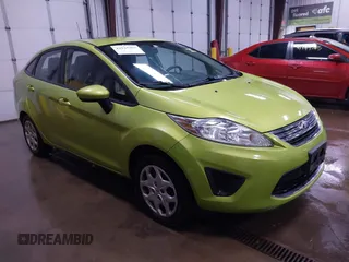 2011 Ford Fiesta SE z VIN 3FADP4BJ7BM132611, wystawiony jako IAAI lot #41931003 z przebiegiem 120 888 mil mil oraz . Historia ofert i sprzedaży dostępna na DreamBid. Obrazek 1.