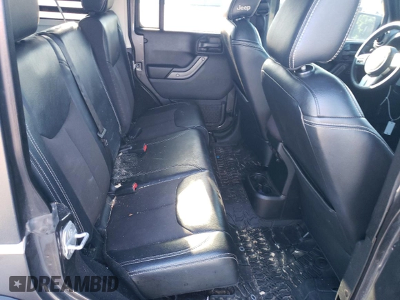 2018 Jeep Wrangler JK Unlimited Sport S with VIN 1C4BJWDGXJL827424, listed as a Copart auction lot 69736084 with 132,151 mi miles and Salvage Title. Bid and sale history available at carsss.com. Image 10.