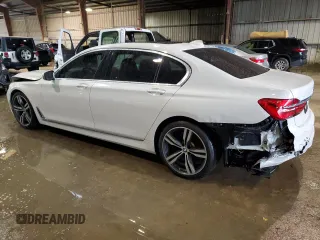 2017 BMW 7 Series 740i with VIN WBA7E2C52HG739888, listed as a Copart auction lot 72703492 with 94,241 mi miles. Bid and sale history available at carsss.com. Image 2.