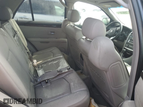 2009 Cadillac SRX RWD z VIN 1GYEE637790101241, wystawiony jako Copart lot #78983654 z przebiegiem Nie podano mil oraz Szkoda całkowita • Salvage title. Historia ofert i sprzedaży dostępna na DreamBid. Obrazek 11.