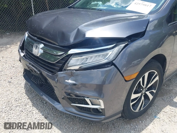 2018 Honda Odyssey Elite with VIN 5FNRL6H95JB087952, listed as a IAAI auction lot 42579817 with 96,577 mi miles and . Bid and sale history available at DreamBid. Image 19.