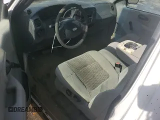 2003 Ford F-150 XL with VIN 1FTRF17W33NA54471, listed as a Copart auction lot 42594765 with 134,409 mi miles and Salvage Title. Bid and sale history available at DreamBid. Image 8.