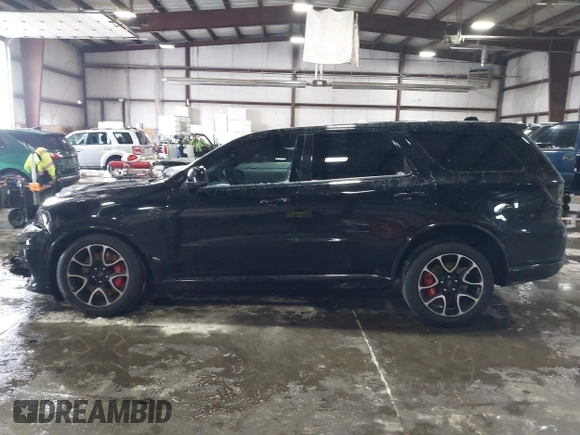 2023 Dodge Durango SRT Hellcat Premium z VIN 1C4SDJH90PC596225, wystawiony jako IAAI lot #41600943 z przebiegiem 18 877 mil mil oraz . Historia ofert i sprzedaży dostępna na DreamBid. Obrazek 15.