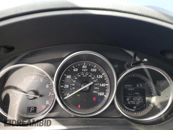 2015 Mazda CX-5 Grand Touring with VIN JM3KE2DY4F0526671, listed as a Copart auction lot 46520505 with 129,017 mi miles and Salvage Title. Bid and sale history available at carsss.com. Image 9.