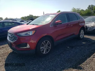 2019 Ford Edge SEL z VIN 2FMPK4J90KBC31202, wystawiony jako Copart lot #61411485 z przebiegiem 93 524 mil mil oraz Czysty tytuł • Clean title. Historia ofert i sprzedaży dostępna na DreamBid. Obrazek 1.