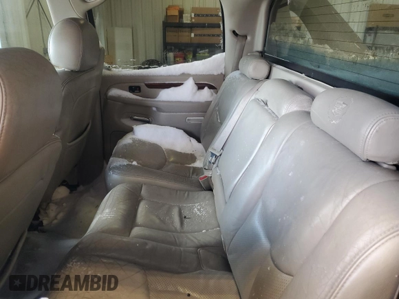2004 Cadillac Escalade EXT z VIN 3GYEK62N34G324955, wystawiony jako Copart lot #87479764 z przebiegiem 218 127 mil mil oraz Szkody całkowita. Historia ofert i sprzedaży dostępna na DreamBid. Obrazek 10.