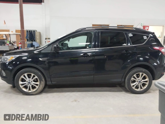2017 Ford Escape SE with VIN 1FMCU0GD7HUB92091, listed as a IAAI auction lot 41984845 with 192,021 mi miles and . Bid and sale history available at DreamBid. Image 14.