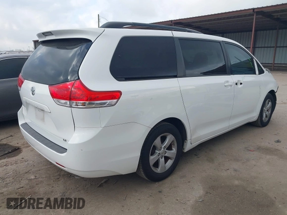 2014 Toyota Sienna LE AAS with VIN 5TDKK3DC6ES526159, listed as a IAAI auction lot 41522210 with 123,563 mi miles and . Bid and sale history available at DreamBid. Image 4.