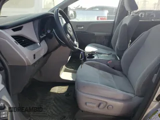 2017 Toyota Sienna LE with VIN 5TDJZ3DC1HS158937, listed as a Copart auction lot 70856204 with 110,572 mi miles and Salvage title. Bid and sale history available at DreamBid. Image 7.