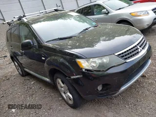 2009 Mitsubishi Outlander XLS z VIN JA4MT41X49Z002610, wystawiony jako IAAI lot #42314661 z przebiegiem 163 472 mil mil oraz . Historia ofert i sprzedaży dostępna na DreamBid. Obrazek 1.