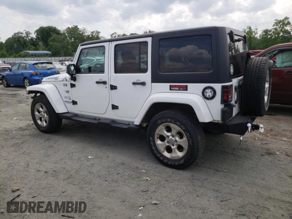 2013 Jeep Wrangler Unlimited Sahara with VIN 1C4HJWEG9DL628684, listed as a Copart auction lot 57672175 with 69,010 mi miles and Salvage title. Bid and sale history available at DreamBid. Image 2.