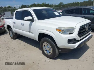 2018 Toyota Tacoma SR z VIN 5TFAX5GN8JX124041, wystawiony jako IAAI lot #42161152 z przebiegiem 130 307 mil mil oraz . Historia ofert i sprzedaży dostępna na DreamBid. Obrazek 1.