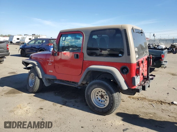 2000 Jeep Wrangler Sport with VIN 1J4FA49S1YP703560, listed as a Copart auction lot 73647844 with 117,300 mi miles and Salvage Title. Bid and sale history available at carsss.com. Image 2.