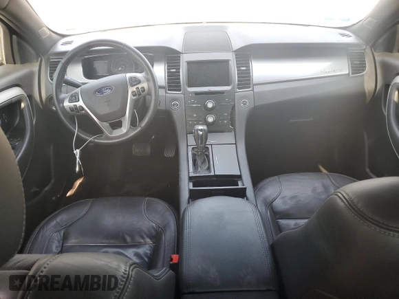 2015 Ford Taurus SEL with VIN 1FAHP2E96FG161735, listed as a Copart auction lot 61865294 with 148,070 mi miles and Salvage Title. Bid and sale history available at DreamBid. Image 8.