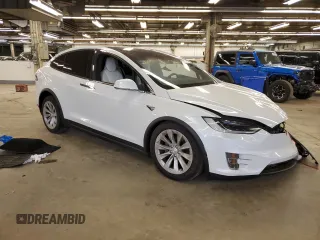 2016 Tesla Model X 70D with VIN 5YJXCBE24GF027807, listed as a Copart auction lot 50504814 with 0 mi miles and Salvage Title. Bid and sale history available at carsss.com. Image 4.