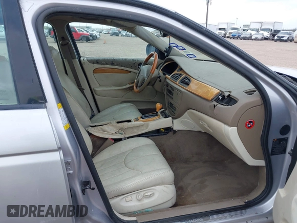 2001 Jaguar S-Type with VIN SAJDA01P91GM04421, listed as a IAAI auction lot 41676230 with 139,403 mi miles and . Bid and sale history available at DreamBid. Image 5.