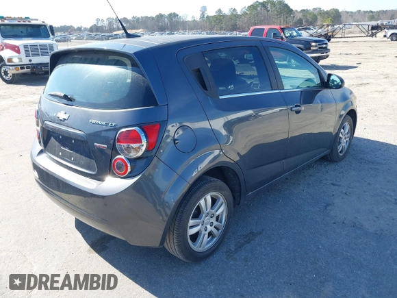 2013 Chevrolet Sonic LT with VIN 1G1JC6SB1D4164944, listed as a IAAI auction lot 41496975 with 96,987 mi miles. Bid and sale history available at carsss.com. Image 4.