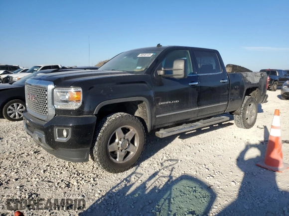 2015 GMC Sierra 2500HD Denali z VIN 1GT120E89FF153186, wystawiony jako Copart lot #88546105 z przebiegiem 418 972 mil mil oraz Czysty tytuł • Clean title. Historia ofert i sprzedaży dostępna na DreamBid. Obrazek 1.