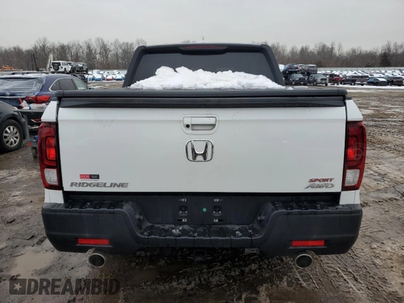 2021 Honda Ridgeline Sport with VIN 5FPYK3F15MB018801, listed as a Copart auction lot 60454925 with 28,032 mi miles and Salvage title. Bid and sale history available at DreamBid. Image 6.