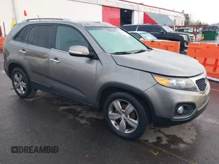2013 Kia Sorento EX with VIN 5XYKUDA64DG320588, listed as a IAAI auction lot 41204828 with 164,146 mi miles. Bid and sale history available at carsss.com. Image 1.