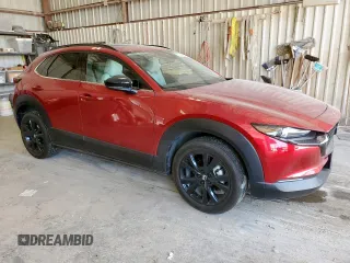 2025 Mazda CX-30 Premium with VIN 3MVDMBDY1SM801827, listed as a Copart auction lot 61619945 with 2,936 mi miles and Salvage title. Bid and sale history available at DreamBid. Image 4.