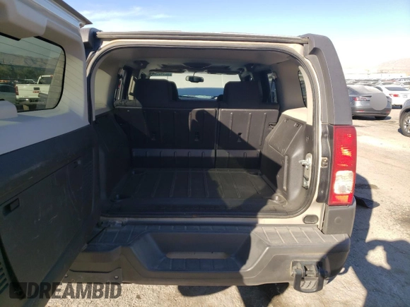 2007 Hummer H3 SUV with VIN 5GTDN13E378208605, listed as a Copart auction lot 82049904 with 129,055 mi miles and Salvage Title. Bid and sale history available at DreamBid. Image 6.