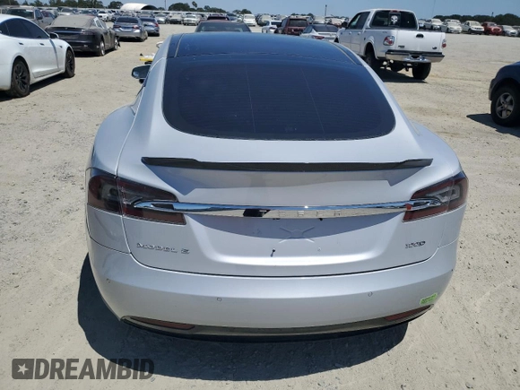 2016 Tesla Model S 90D с VIN 5YJSA1E23GF144496, выставлен на аукционе Copart как лот 64080845 с пробегом 34 847 миль миль и Списание • Salvage title. История ставок и продаж доступна на DreamBid. Изображение 6.