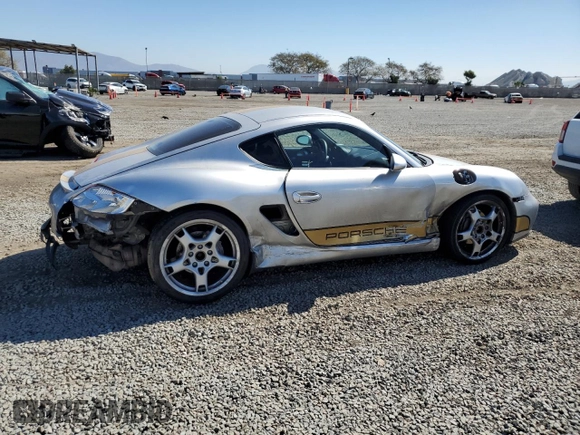 2007 Porsche 718 Cayman z VIN WP0AA29817U760642, wystawiony jako Copart lot #43905015 z przebiegiem Nie podano mil oraz Szkoda całkowita • Salvage title. Historia ofert i sprzedaży dostępna na DreamBid. Obrazek 3.