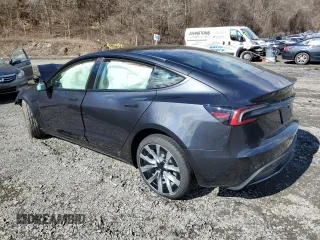 2025 Tesla Model 3 Long Range with VIN 5YJ3E1EB6SF921092, listed as a Copart auction lot 46918025 with 1,403 mi miles and Salvage Title. Bid and sale history available at DreamBid. Image 2.