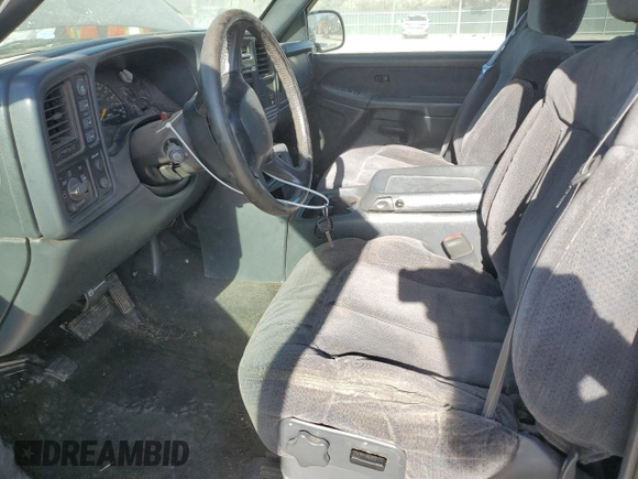 1999 Chevrolet Silverado 1500 LT with VIN 1GCEK19T9XE255438, listed as a Copart auction lot 50556165 with 185,557 mi miles and Salvage Title. Bid and sale history available at DreamBid. Image 7.