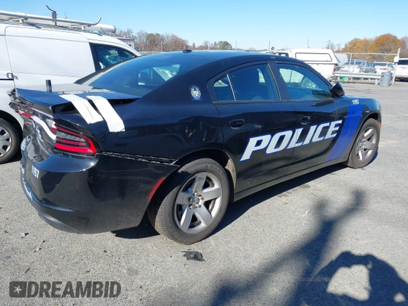 2022 Dodge Charger Police with VIN 2C3CDXAT3NH109952, listed as a IAAI auction lot 40919989 with 19,169 mi miles and . Bid and sale history available at DreamBid. Image 4.