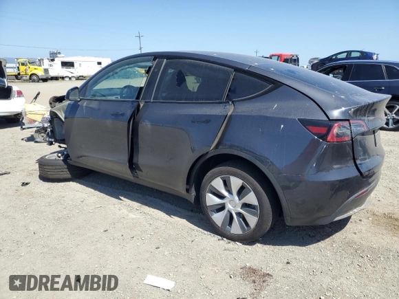 2024 Tesla Model Y Long Range z VIN 7SAYGDEE6RF032348, wystawiony jako Copart lot #58158355 z przebiegiem Nie podano mil oraz Szkoda całkowita • Salvage title. Historia ofert i sprzedaży dostępna na DreamBid. Obrazek 2.