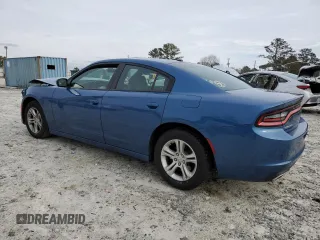 2021 Dodge Charger SXT with VIN 2C3CDXBGXMH587740, listed as a Copart auction lot 44844385 with 74,643 mi miles and Salvage Title. Bid and sale history available at carsss.com. Image 2.