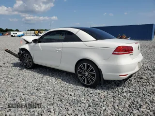 2013 Volkswagen Eos Sport с VIN WVWBW8AH8DV001948, выставлен на аукционе Copart как лот 56292615 с пробегом 75 398 миль миль и На запчасти • Non repairable. История ставок и продаж доступна на DreamBid. Изображение 2.